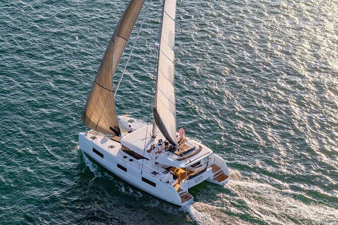 Milos & Poliegos Catamaran Cruise Homemade Full menu BBQ & Drinks - The Sum Up