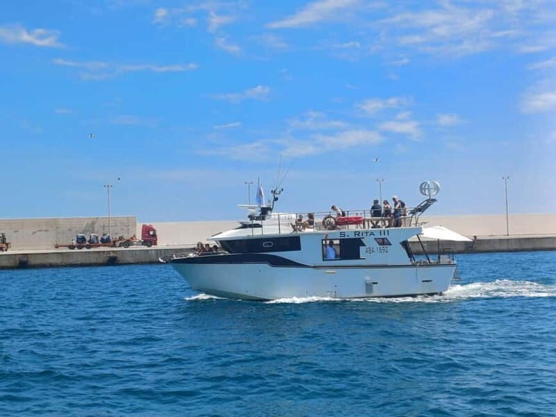 Monopoli: Boat Tour with Swim Stop in the Adriatic Sea - An overview of the experience