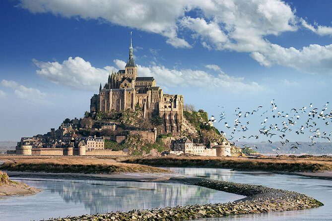 Mont St Michel Guided Day Trip from Paris in Minivan - Key Points
