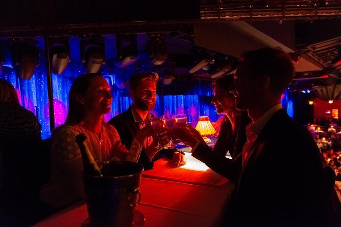 Moulin Rouge Dinner Show with Champagne and Drop Off - Post-Show Convenience: Drop-Off at Major Paris Neighborhoods
