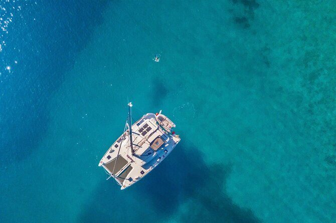 Mykonos: Private Catamaran Cruise with BBQ & Drinks - The Sum Up