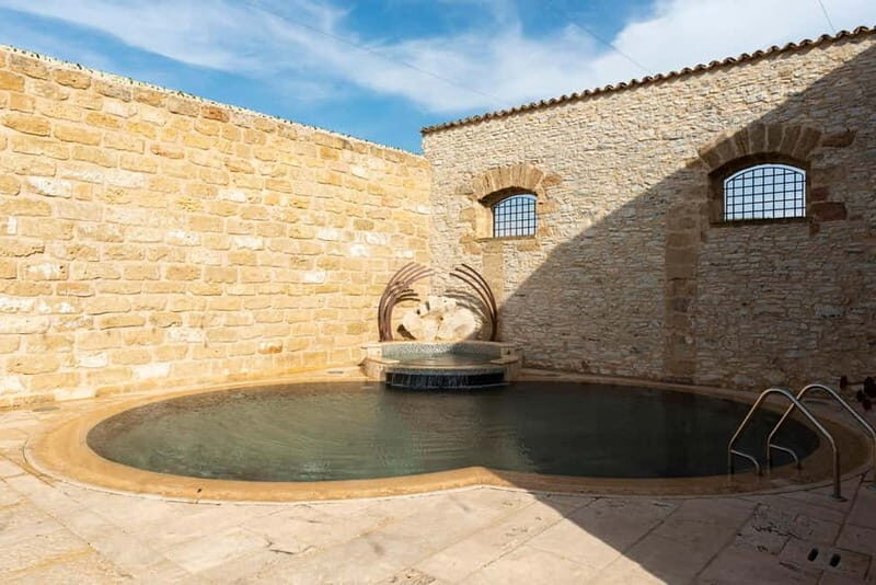 Nature and relaxation by the pool at Baglio Passofondo Estates - Who Should Consider This Experience?
