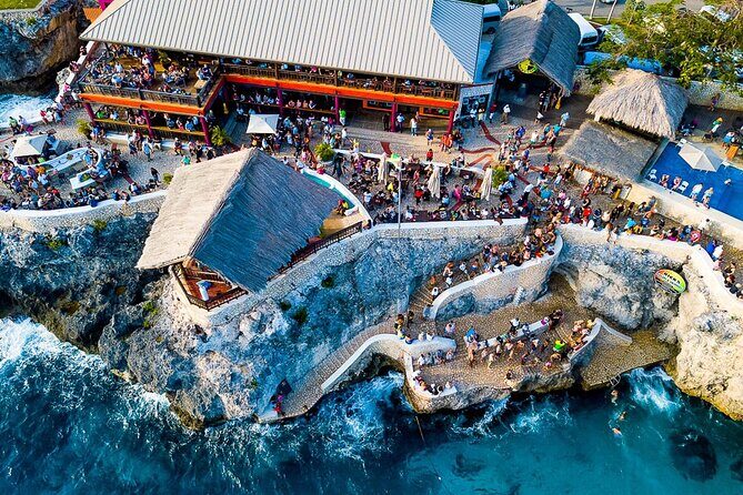 Negril Beach Rick's Cafe Bamboo Rafting Margaritaville Shopping - Key Points