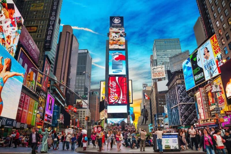 NYC: Midtown Stroll Guided Walking Tour English-Spanish - Key Points