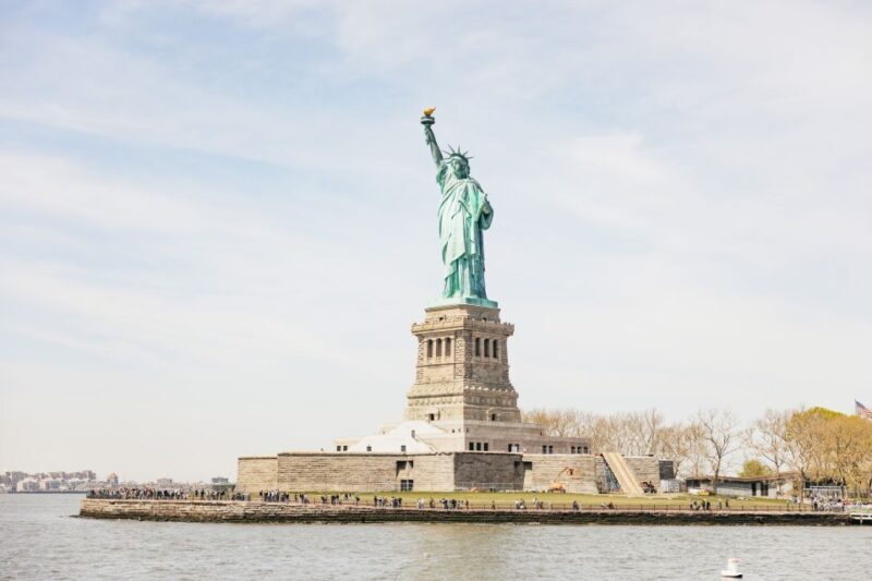 NYC: Wall Street Tour with 9/11 Memorial and Statue Ferry - Exploring the Financial District and Lower Manhattan