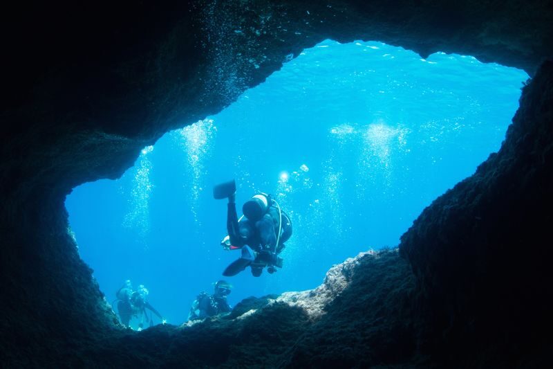 Okinawa Onna Blue Cave Snorkeling or Beginner Scuba Diving - The Blue Cave is the main event, but the sea makes the call
