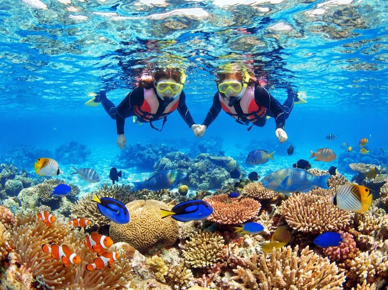 Okinawa Onna Village Blue Cave Snorkeling Experience (includes free GoPro rental) - Reaching the Blue Cave by boat
