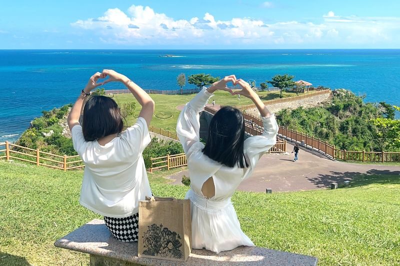 Okinawa Southern Popular Attractions Day Tour with Chinese Guide: Okinawa World & Gyokusendo Cave (including admission) - Shinbara Beach - Senaga Island - Outlet/DMM Kariyushi Aquarium - Chinen Misaki Park - What to know before you book
