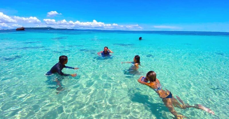 Okinawa: Tsuken Island Day Trip, Water Sports, and BBQ Lunch - The Journey Begins at Heshikiya Port