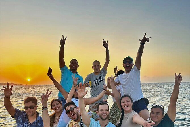 Open bar sunset party in the bay sharing with natives - The Experience in Detail