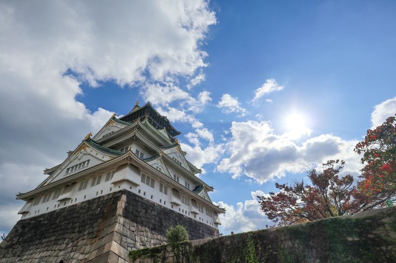 Osaka Castle & Local Neighborhoods 5h Bike Tour with Lunch - Cycling past the Japan Mint area