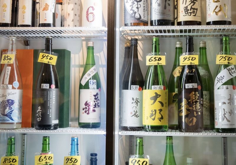 Osaka Dotombori Food & Local Izakaya Bar Crawl Tour - The final bar: a local ending, with a cost to check