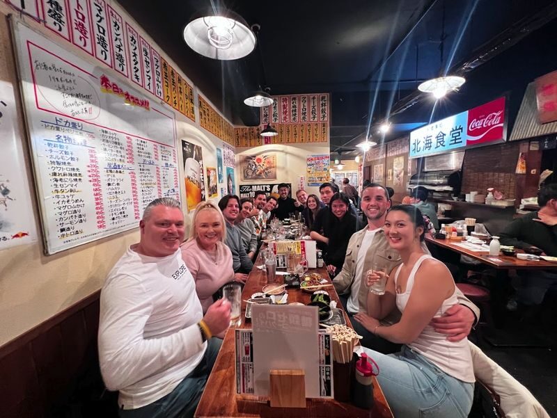 Osaka Dotombori Food & Local Izakaya Bar Crawl Tour - What the guide adds to the night