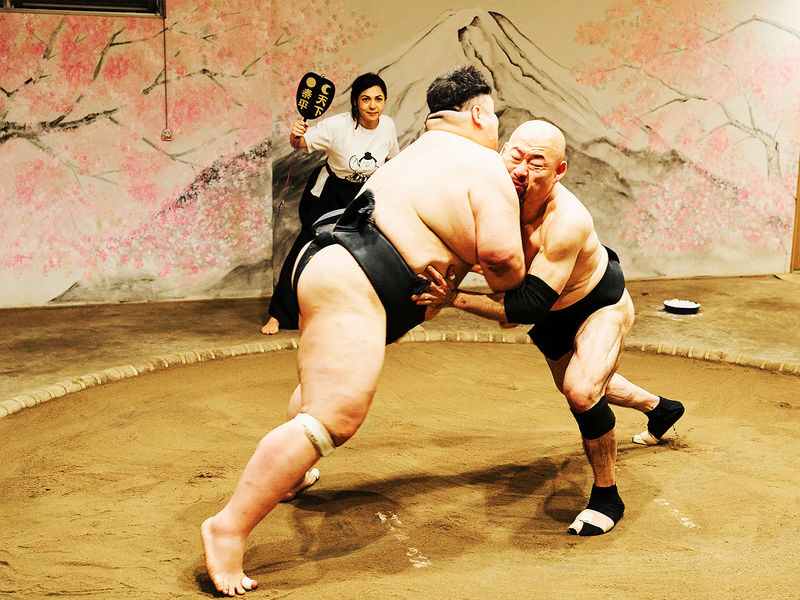 Osaka: Sumo Show with Live Match & Audience Challenge - Watching training moves before the match