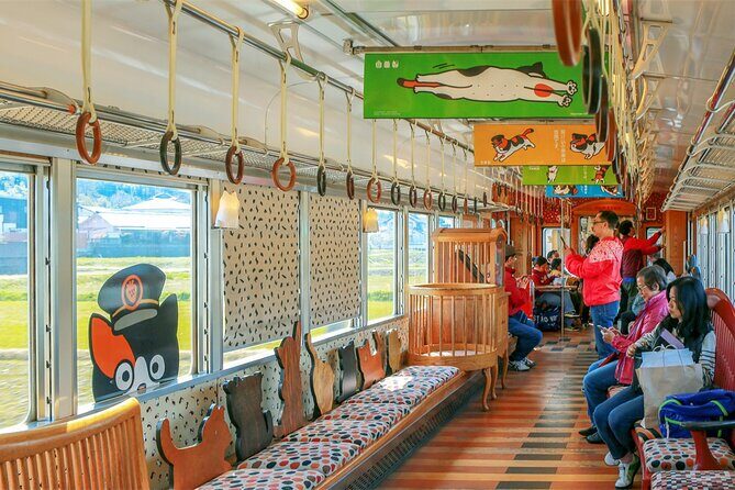 Osaka Wakayama Cat Train, Seafood market, Hot Springs Tour - Optional Relaxation at Shirahama Onsen