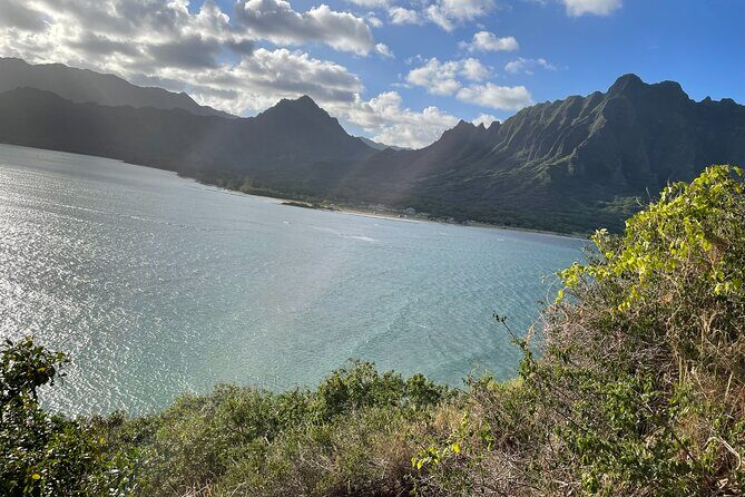Paddle boarding and hiking adventure at Mokoli'i Island. - Key Points