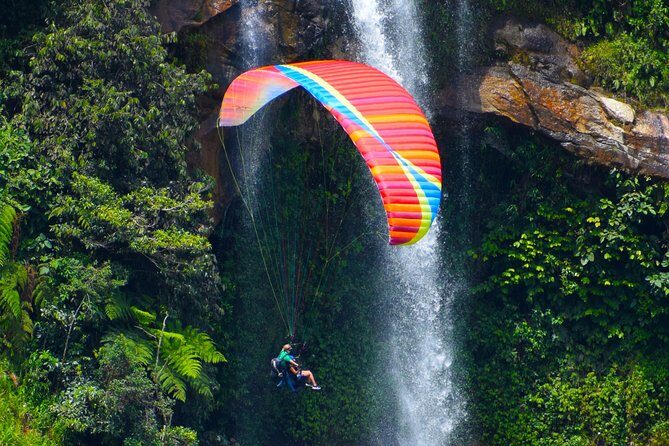 PARAGLIDING over giant waterfalls private tour (optional Guatape) from Medellin - Key Points