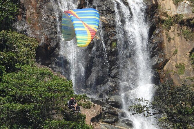 PARAGLIDING over giant waterfalls private tour (optional Guatape) from Medellin - Key Points