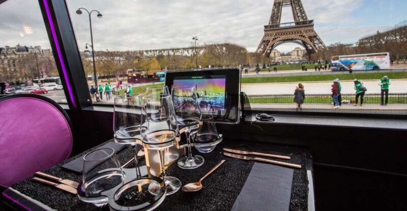 Paris: Champs Elysées Bus Toqué w/Lunch & Glass of Champagne - The Sum Up