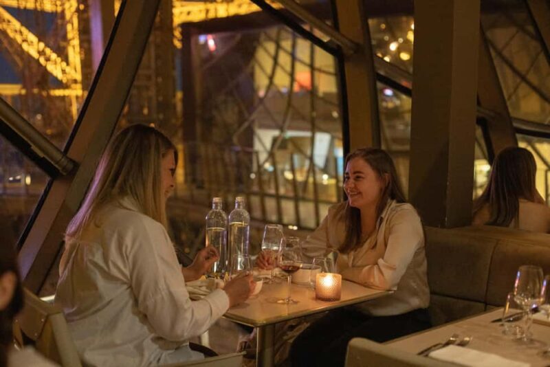 Paris: Christmas Dinner with champagne in the Eiffel Tower - Key Points