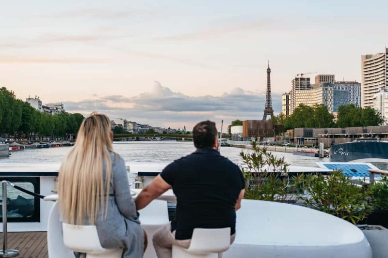 Paris: Gourmet Dinner Cruise on Seine River with Live Music - The Onboard Ambiance and Setting