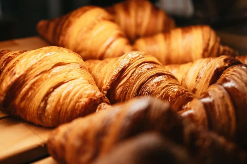 Paris: Gourmet Food Tour with Over 10 Tastings and Wine - Exploring the Famous Street Market and King Louis XV’s Pastry Shop