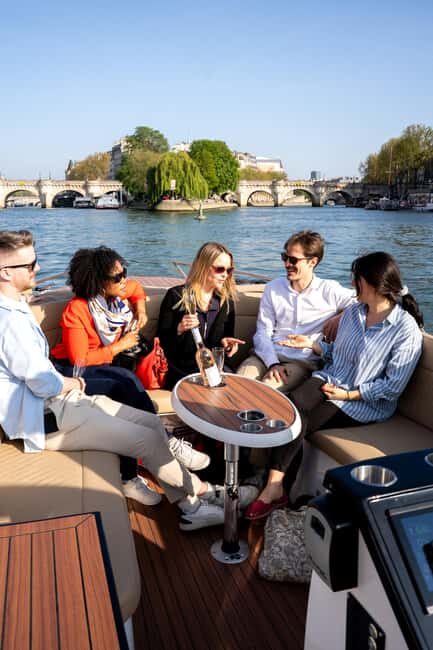 Paris: Private Small Boat Cruise with Rosé and Macarons - The Sum Up