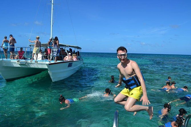 Party boat in Catamaran with Open Bar Only Adults + Snorkeling - The Experience at a Glance