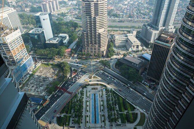 Petronas Twin Tower Skybridge View & Dining Experience Tour with Local Host - Practicalities & Tips for Visitors