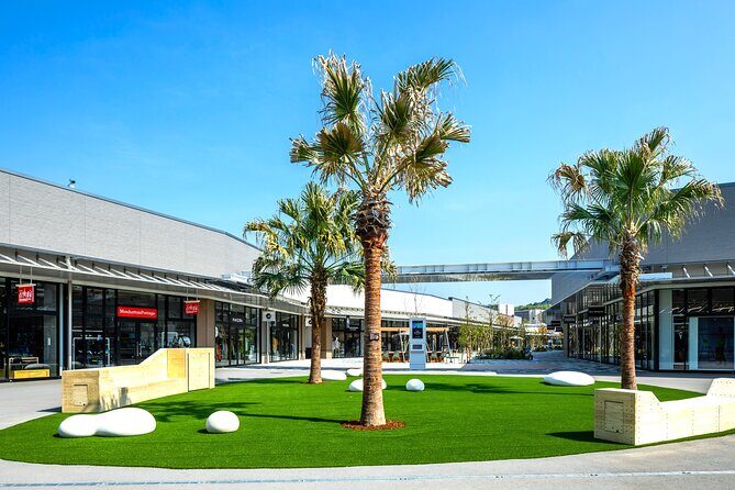 Photogenic Kawachi Wisterias Garden Day Bus Tour from Fukuoka - Outlet Kitakyushu: Shopping and lunch