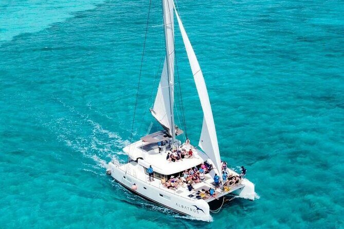 Plus Full Day Catamaran Tour to Isla Mujeres All Inclusive - Sunset Return and Final Impressions