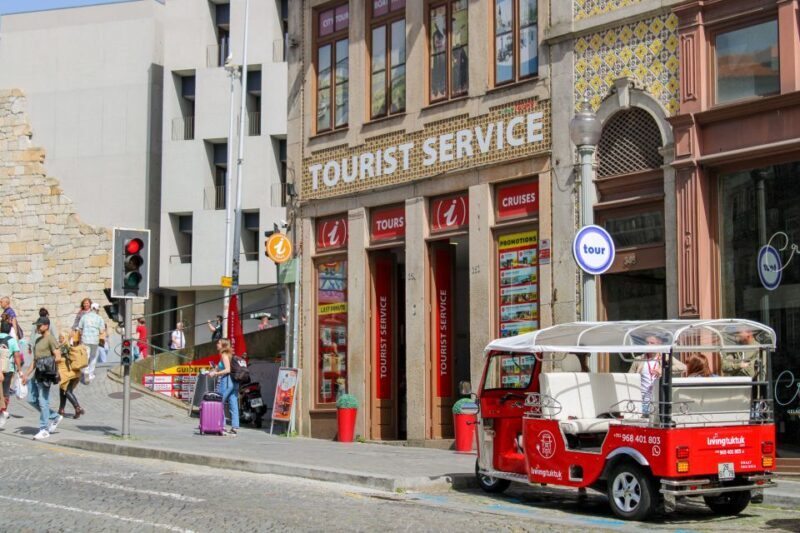 Porto: Tuk Tuk Sunset Tour with Glass of Port Wine - The Sunset and Port Wine Toast