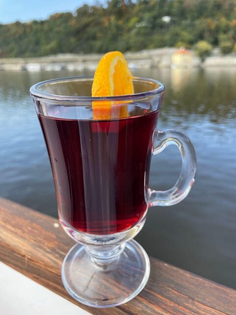 Prague: Advent Boat Cruise with Sweets and Hot Drinks - Festive Atmosphere and Musical Accompaniment