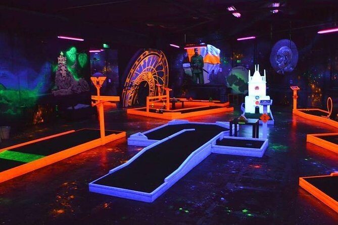 Prague Black Light Mini Golf and Games Tour Including Free Drinks - A Unique Night Out in Prague: Black Light Mini Golf and Games