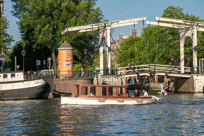 Private Boat Tour Amsterdam - 90 Min incl. welcome drink on historic saloon boat - Key Points