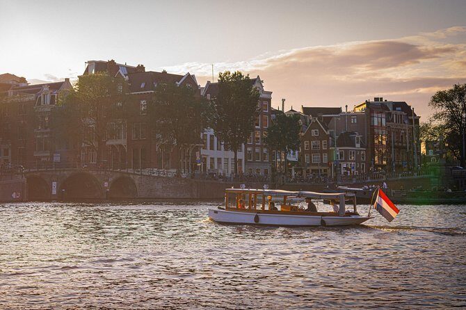 Private Boat Tour Amsterdam - 90 Min incl. welcome drink on historic saloon boat - Onboard Experience: Drinks, Comfort, and Customization