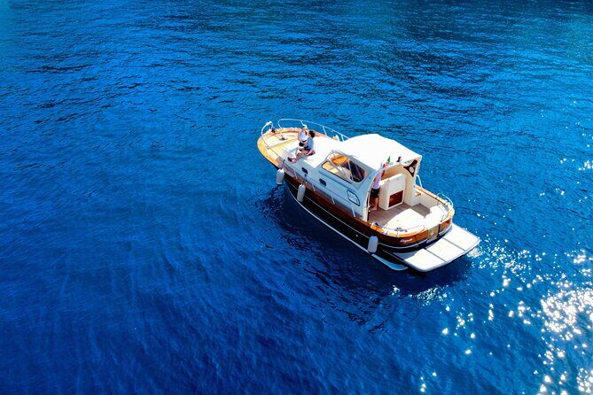 Private boat tour to Capri and Blue Grotto on Gozzo 32 ft - Detailed Itinerary Breakdown