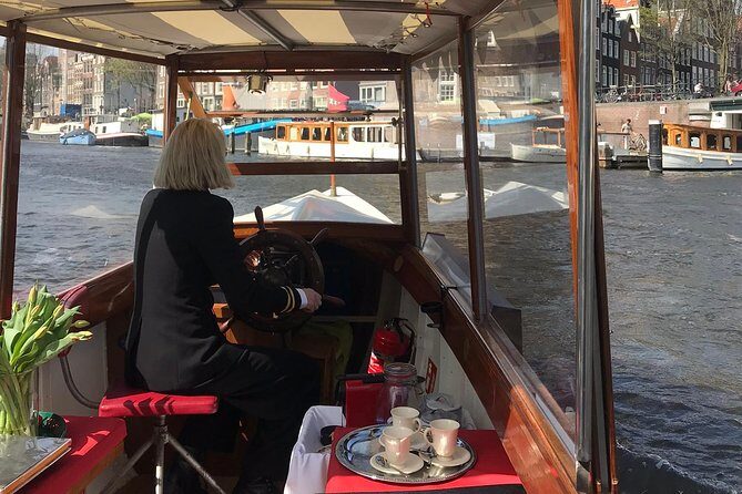 Private canal cruise on small historic boat - The Sum Up
