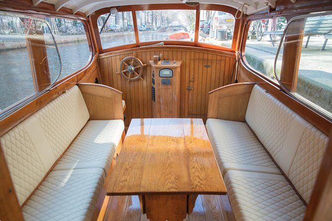 Private Guided Historic Amsterdam Canal Cruise in a Salon Boat - What Makes This Tour Stand Out?