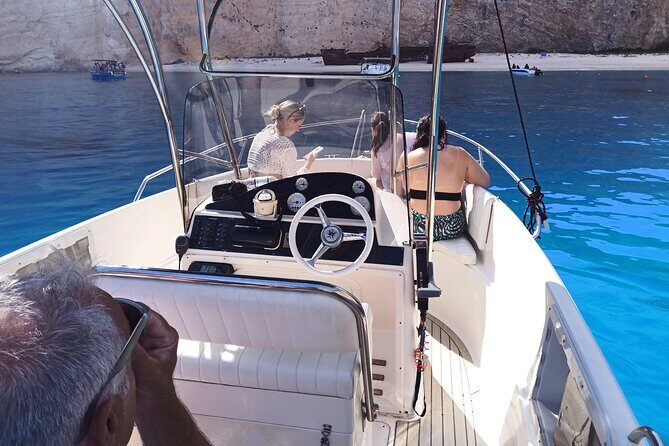 Private Luxury 6.5m 140hp Speedboat cruise Shipwreck & Blue Caves - The Sum Up