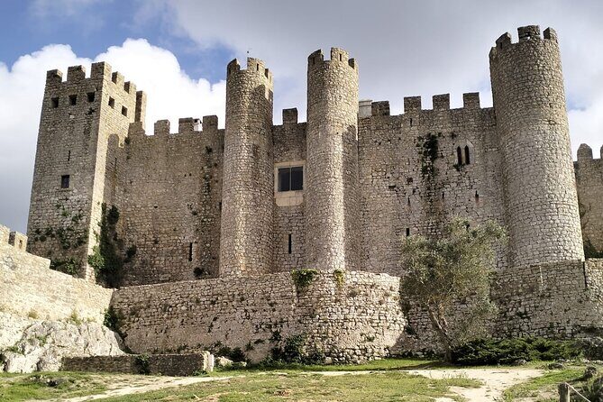 Private Transfer Porto to Lisbon with Nazaré and Óbidos Stops - The Sum Up