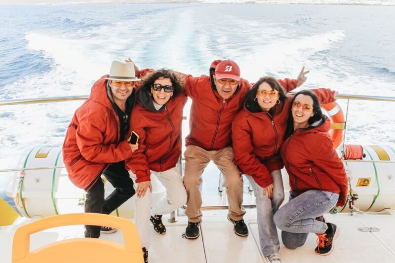 Puerto del Carmen: Dolphin-Watching Speedboat Tour with Swim - The Pros and Cons