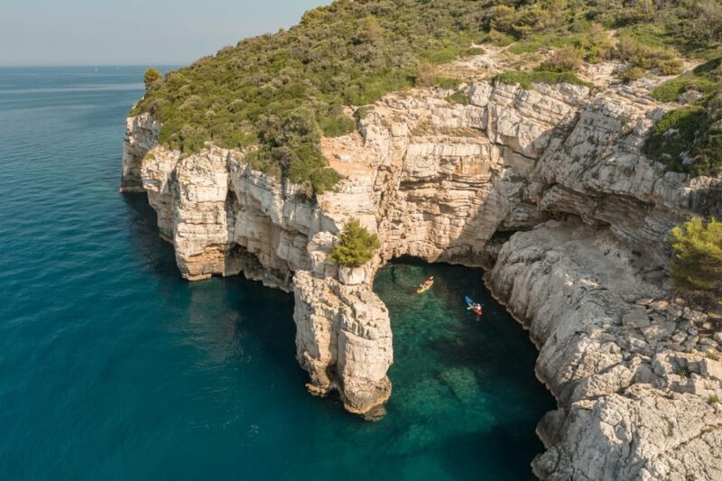 Pula: Cave and Islands Kayak Tour, Snorkeling and Drinks - Key Points
