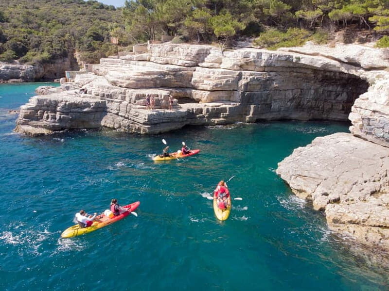 Pula: Sea Adventure  Boat, Kayak, Snorkeling & Cliff Jumps - Kayaking and Exploring the Coastline