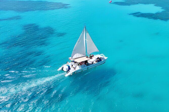 Punta Cana Catamaran Party Snorkeling, Open Bar, Music & Pickup - Key Points