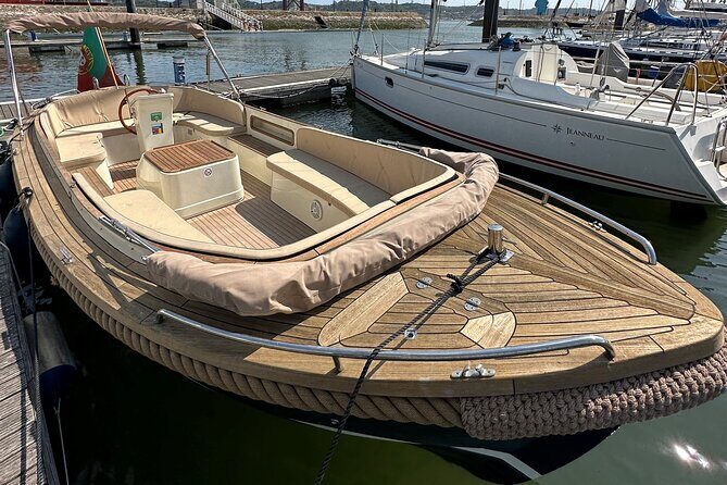 Relax on a Comfortable Small Boat With Open Bar and Snacks - A Detailed Look at This Lisbon Boat Tour
