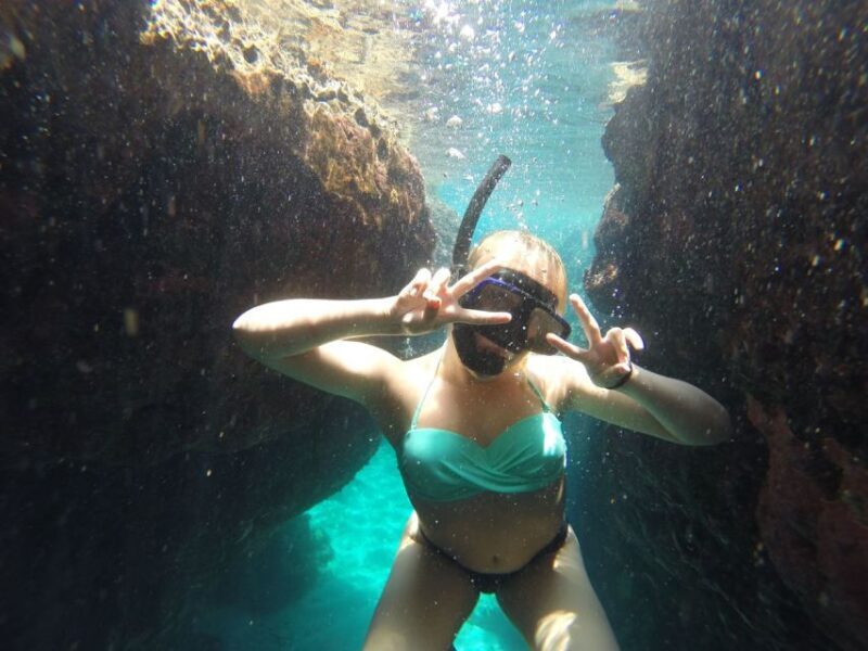 Rhodes: Beach Cruise with Swimming, Meal, & Unlimited Drinks - Authentic Experiences and Guest Feedback