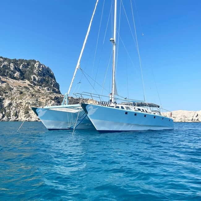 Rhodes: Catamaran Cruise with Meal, Snacks & Swim Stops - Who Should Consider This Tour?