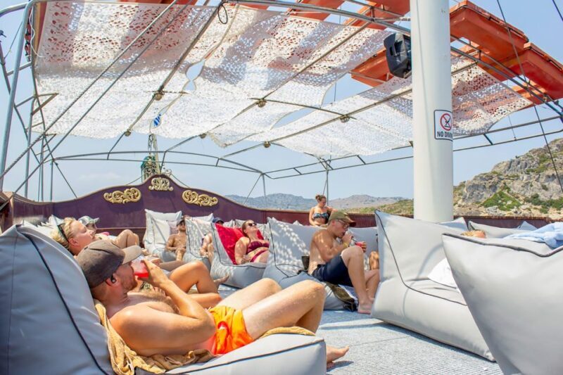Rhodes: Sunset Cruise with Greek BBQ and Unlimited Drinks - Who Should Consider This Tour?