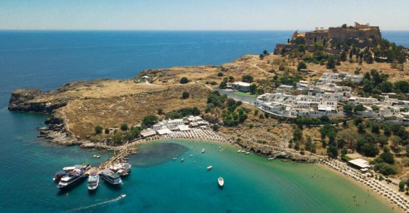 Rhodes Town: Scenic Cruise to Lindos with Swim Stops - The Final Stop: Tsambika Bay and Snorkeling
